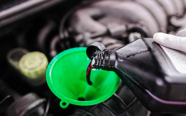 Red Car Transmission Fluid | Robbie's At Your Service in Merritt Island, FL